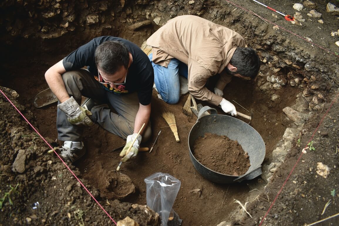 Excavation trenches in the interior of the cave.